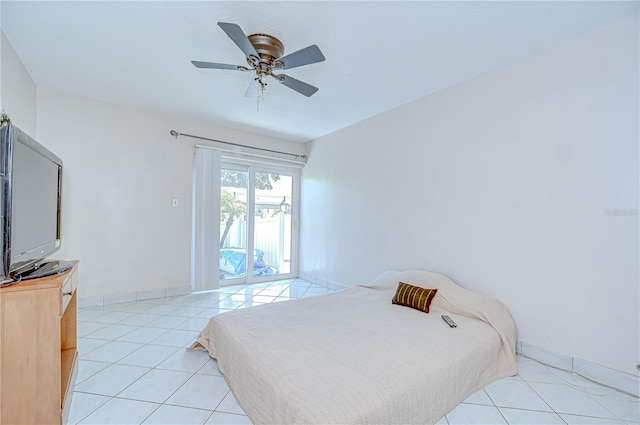 1655 S Highland Ave Unit B118, Clearwater, FL 33756 - bedroom with light tile patterned floors and a ceiling fan