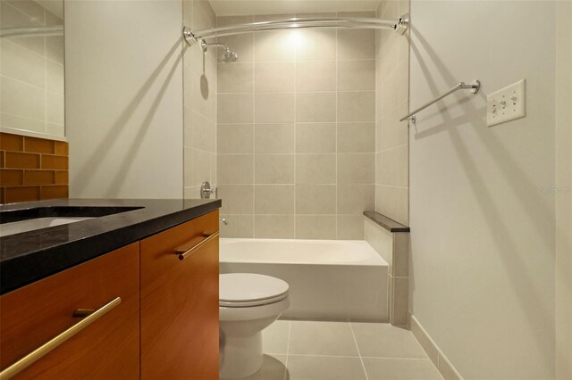 400 4th Ave S Unit 301, Saint Petersburg, FL 33701 - bathroom with vanity, toilet, tile patterned flooring, and tub / shower combination