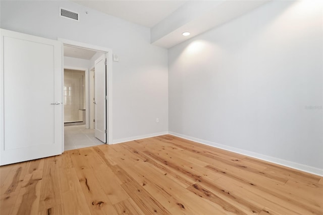 400 4th Ave S Unit 301, Saint Petersburg, FL 33701 - unfurnished room with light wood-style flooring and baseboards