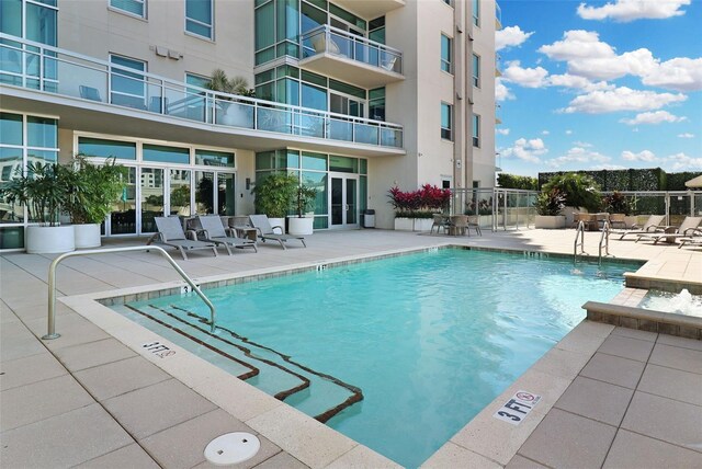 400 4th Ave S Unit 301, Saint Petersburg, FL 33701 - community pool featuring a patio area