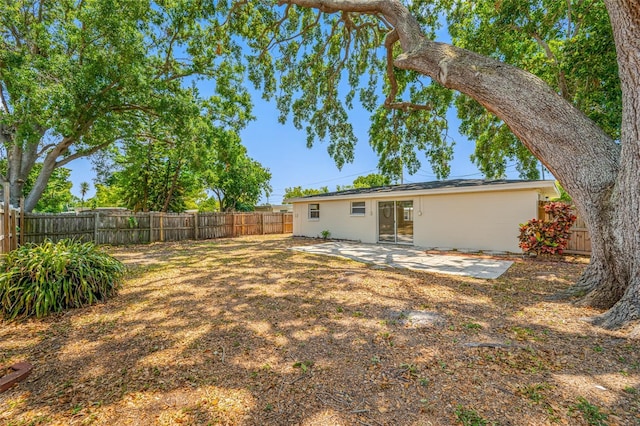 10599 111th Ave N, Largo, FL 33773 - fenced backyard featuring a patio