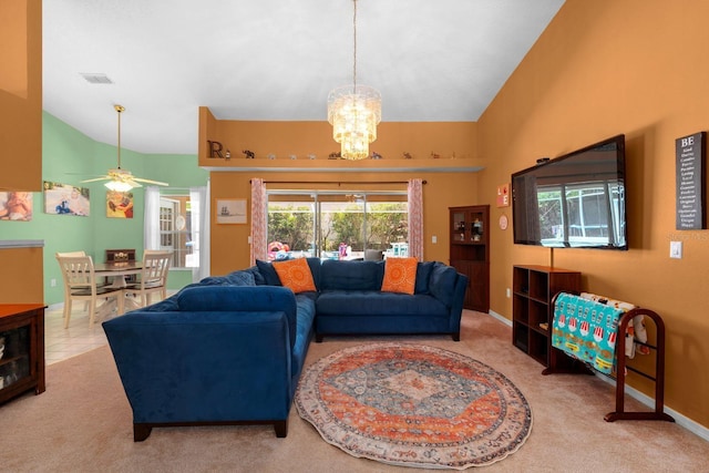 10228 Yellow Pine Way, Hudson, FL 34667 - carpeted living area with lofted ceiling, a chandelier, a ceiling fan, and baseboards