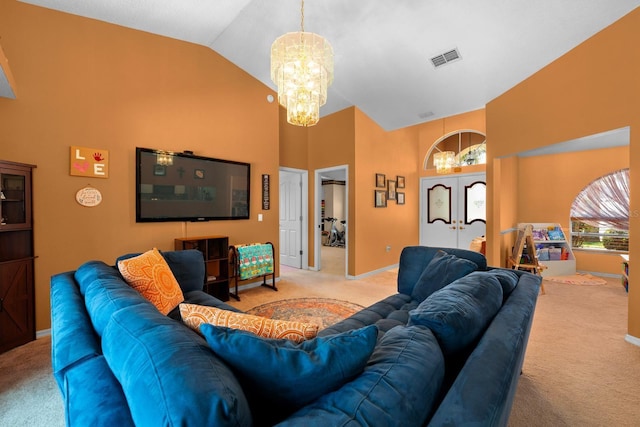 10228 Yellow Pine Way, Hudson, FL 34667 - carpeted living area featuring a chandelier, high vaulted ceiling, and baseboards