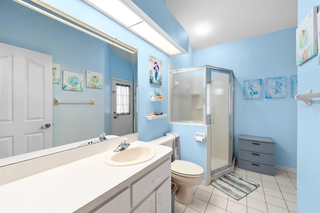 10228 Yellow Pine Way, Hudson, FL 34667 - bathroom featuring toilet, a stall shower, vanity, and tile patterned flooring