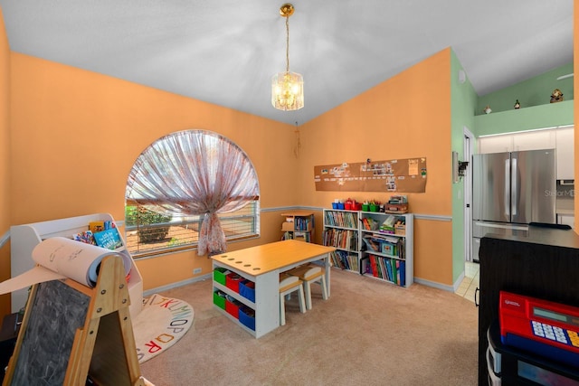 10228 Yellow Pine Way, Hudson, FL 34667 - recreation room with a chandelier, carpet floors, baseboards, and lofted ceiling