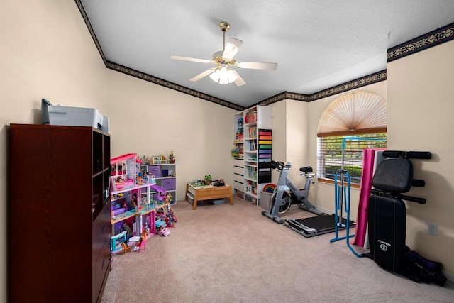 10228 Yellow Pine Way, Hudson, FL 34667 - game room featuring carpet, a ceiling fan, ornamental molding, and baseboards