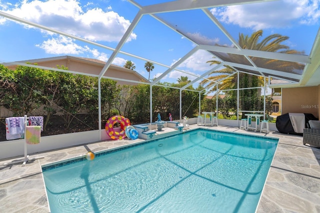 10228 Yellow Pine Way, Hudson, FL 34667 - swimming pool with a patio, a lanai, and a grill