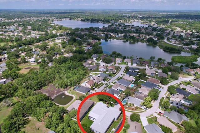 4315 Whittner Dr, Land O Lakes, FL 34639 - aerial view of property and surrounding area featuring a large body of water and nearby suburban area