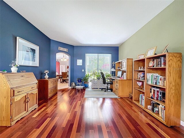 4315 Whittner Dr, Land O Lakes, FL 34639 - office area featuring dark wood-type flooring and arched walkways