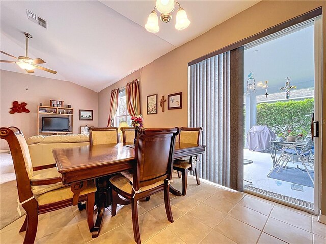 4315 Whittner Dr, Land O Lakes, FL 34639 - dining space featuring lofted ceiling, a ceiling fan, and light tile patterned floors