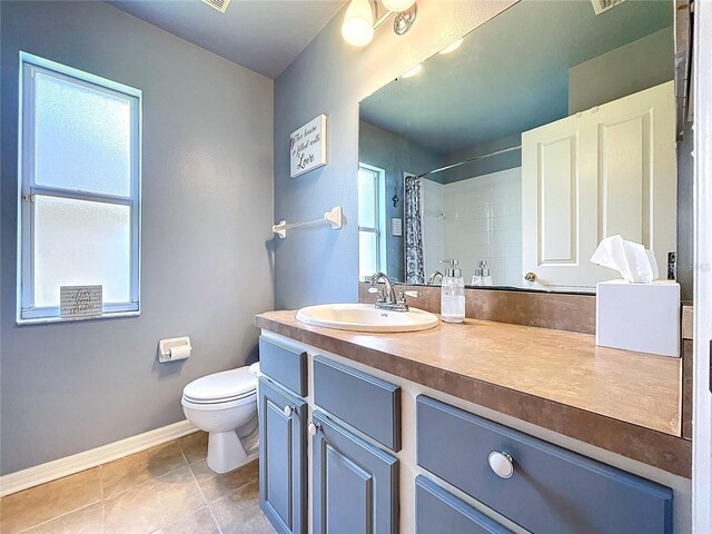 4315 Whittner Dr, Land O Lakes, FL 34639 - full bath with vanity, tile patterned flooring, and a shower with shower curtain