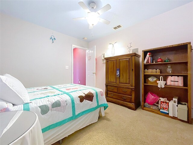 4315 Whittner Dr, Land O Lakes, FL 34639 - bedroom with light colored carpet and ceiling fan