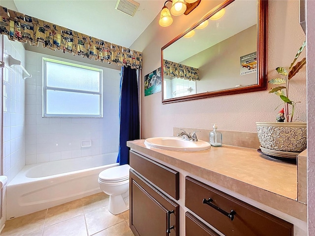 4315 Whittner Dr, Land O Lakes, FL 34639 - bathroom featuring vanity, shower / tub combo with curtain, and tile patterned flooring