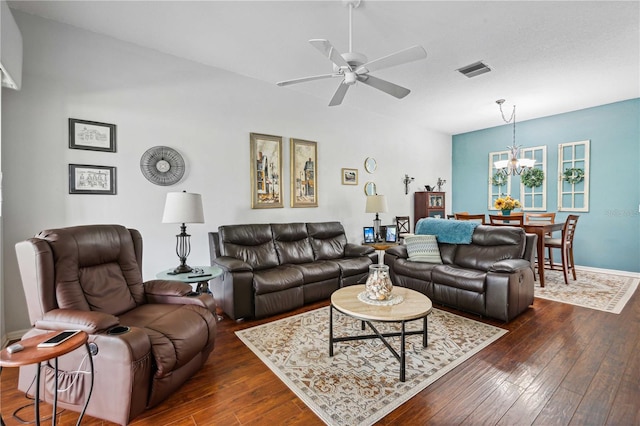 5143 Lochmead Ter, Zephyrhills, FL 33541 - living area with a chandelier, dark wood finished floors, a ceiling fan, and baseboards