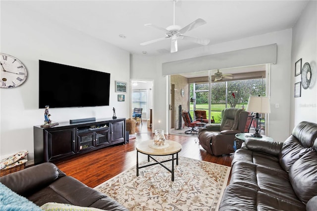 5143 Lochmead Ter, Zephyrhills, FL 33541 - living room featuring ceiling fan and dark wood finished floors