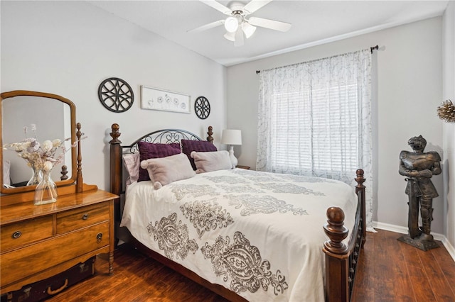 5143 Lochmead Ter, Zephyrhills, FL 33541 - bedroom featuring dark wood finished floors, baseboards, and ceiling fan
