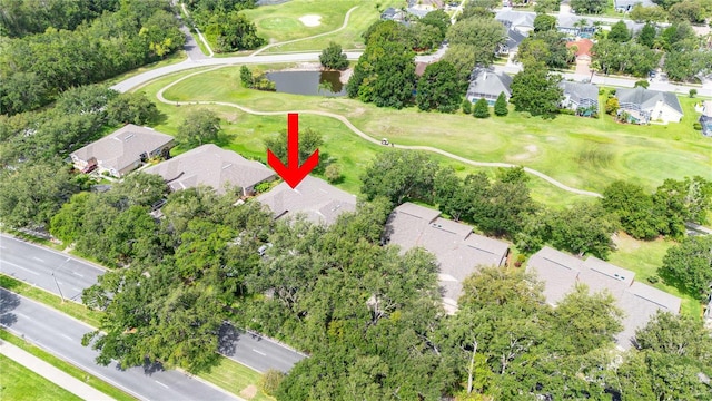 5143 Lochmead Ter, Zephyrhills, FL 33541 - aerial view of property and surrounding area featuring nearby suburban area, a golf course, and a large body of water