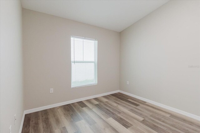 13016 Boggy Creek Dr, Riverview, FL 33579 - unfurnished room with light wood-type flooring and baseboards