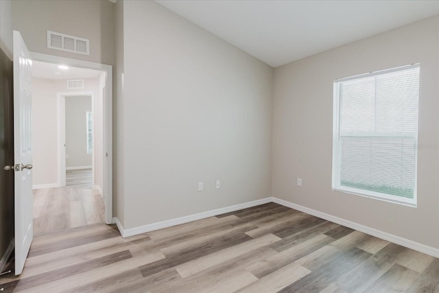 13016 Boggy Creek Dr, Riverview, FL 33579 - unfurnished room featuring wood finished floors, baseboards, and healthy amount of natural light