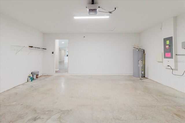 13016 Boggy Creek Dr, Riverview, FL 33579 - garage featuring electric water heater, a garage door opener, and electric panel