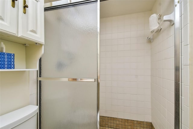 11000 Gulf Blvd Unit 703, Treasure Island, FL 33706 - full bathroom featuring a stall shower and toilet