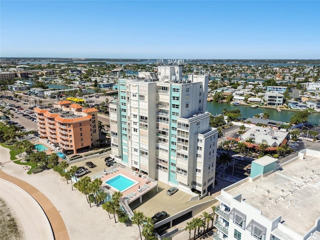 11000 Gulf Blvd Unit 703, Treasure Island, FL 33706 - drone / aerial view of a nearby body of water and a pool area