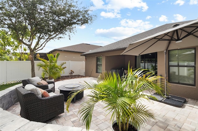 12729 Flatwood Creek Dr, Gibsonton, FL 33534 - fenced backyard with a patio