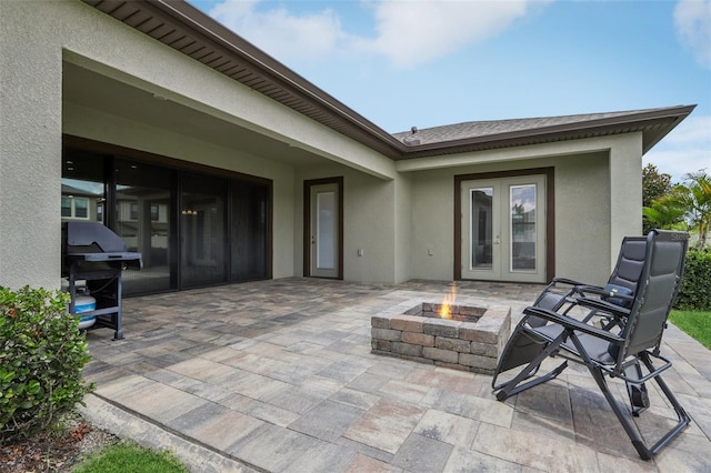 808 Vittorio Pl, Brandon, FL 33511 - view of patio with french doors, an outdoor fire pit, and grilling area