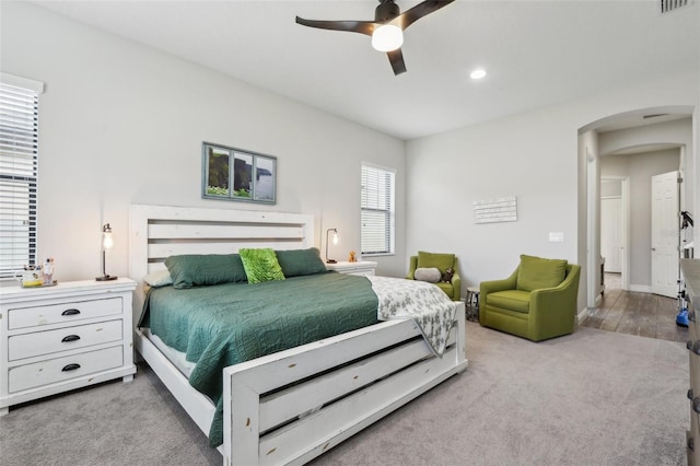 808 Vittorio Pl, Brandon, FL 33511 - carpeted bedroom featuring arched walkways and ceiling fan