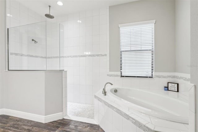 808 Vittorio Pl, Brandon, FL 33511 - bathroom with a garden tub, walk in shower, and wood finished floors
