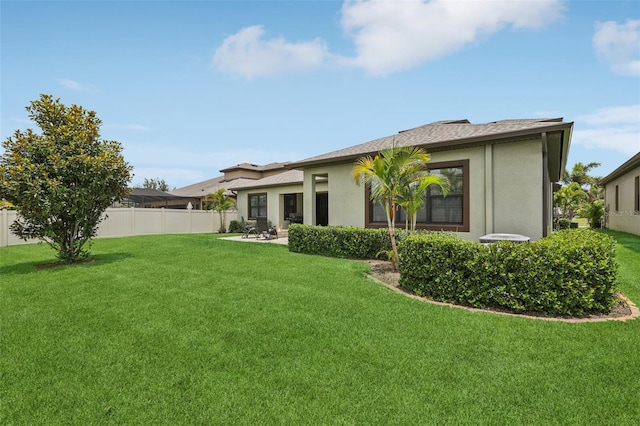 808 Vittorio Pl, Brandon, FL 33511 - rear view of property featuring stucco siding and a patio area