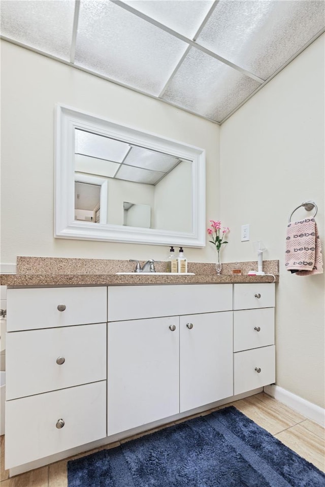 19029 US Highway 19 N Unit 3-1, Clearwater, FL 33764 - bathroom with vanity, baseboards, and tile patterned flooring