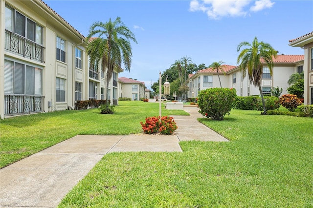 19029 US Highway 19 N Unit 3-1, Clearwater, FL 33764 - view of community featuring a residential view and a yard