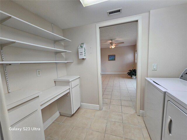 2221 Norwegian Dr Unit 15, Clearwater, FL 33763 - laundry room featuring washer and clothes dryer, cabinet space, light tile patterned floors, baseboards, and ceiling fan