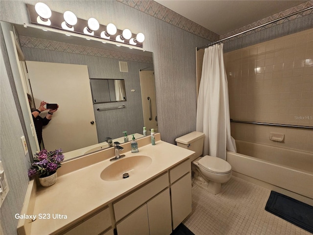 2221 Norwegian Dr Unit 15, Clearwater, FL 33763 - full bathroom with vanity, shower / tub combo, tile patterned flooring, and toilet