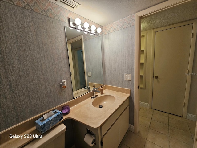 2221 Norwegian Dr Unit 15, Clearwater, FL 33763 - bathroom with tile patterned flooring, vanity, and toilet