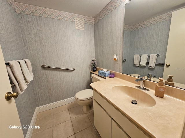 2221 Norwegian Dr Unit 15, Clearwater, FL 33763 - bathroom featuring vanity, tile patterned floors, toilet, and baseboards