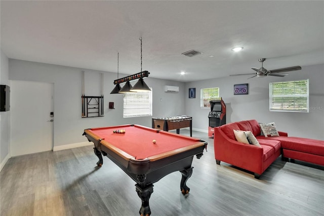 8222 Valrie Ln, Riverview, FL 33569 - recreation room with a wall unit AC, wood finished floors, billiards, ceiling fan, and baseboards