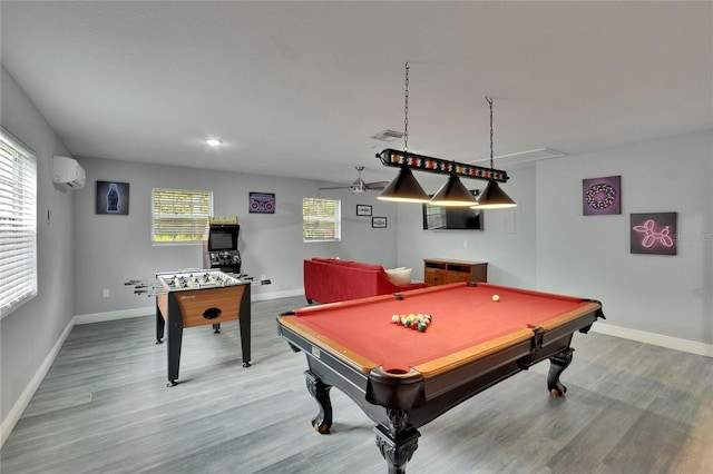 8222 Valrie Ln, Riverview, FL 33569 - rec room featuring an AC wall unit, light wood-style flooring, baseboards, billiards table, and ceiling fan