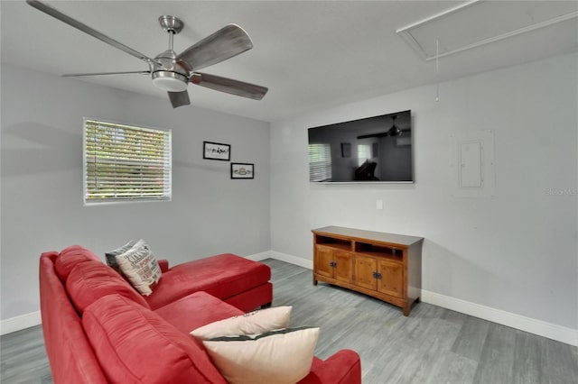 8222 Valrie Ln, Riverview, FL 33569 - living area with attic access, baseboards, and light wood-style floors