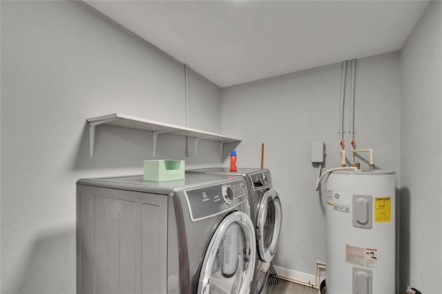 8222 Valrie Ln, Riverview, FL 33569 - laundry area with water heater, independent washer and dryer, wood finished floors, and baseboards