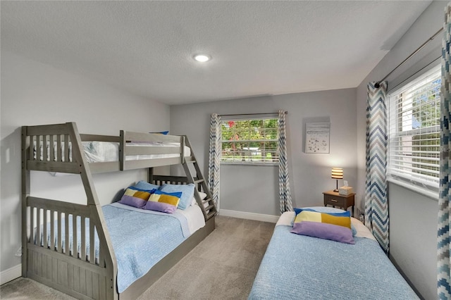 8222 Valrie Ln, Riverview, FL 33569 - bedroom featuring carpet floors, a textured ceiling, baseboards, and recessed lighting