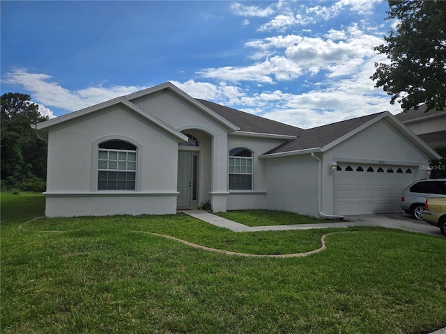 10621 Ribbon Fern Way, Land O Lakes, FL 34638 - ranch-style home with stucco siding, a garage, a front yard, roof with shingles, and concrete driveway