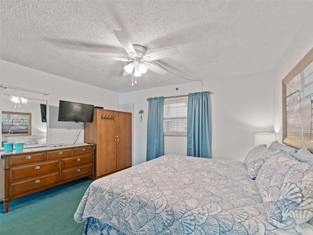 18610 Gulf Blvd Unit 208, Indian Shores, FL 33785 - bedroom with dark colored carpet, a textured ceiling, and ceiling fan