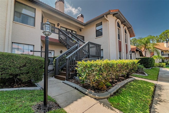 2640 Enterprise Rd E Unit B25, Clearwater, FL 33759 - view of building exterior with stairway