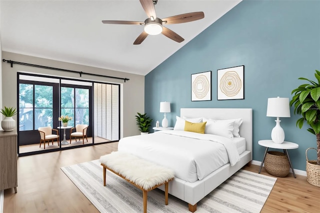 2640 Enterprise Rd E Unit B25, Clearwater, FL 33759 - bedroom with wood finished floors, high vaulted ceiling, baseboards, a ceiling fan, and access to exterior