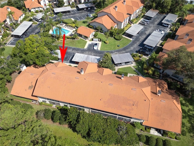2640 Enterprise Rd E Unit B25, Clearwater, FL 33759 - aerial perspective of suburban area with a pool