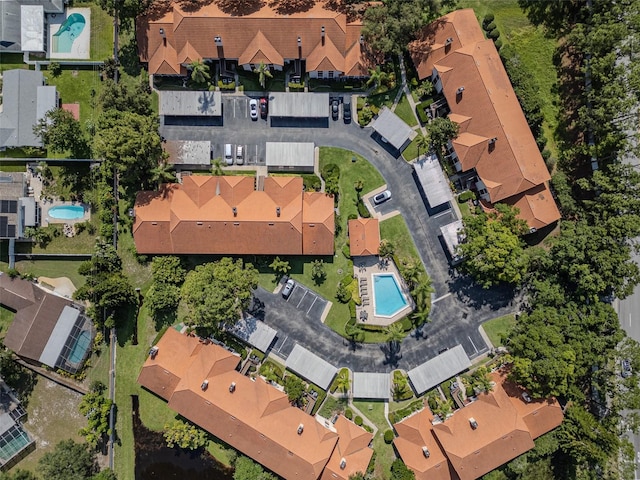 2640 Enterprise Rd E Unit B25, Clearwater, FL 33759 - aerial overview of property's location featuring a pool area and nearby suburban area