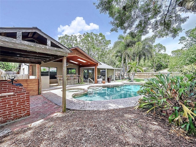 11525 Country Oaks Dr, Tampa, FL 33618 - view of swimming pool with a patio area and exterior kitchen