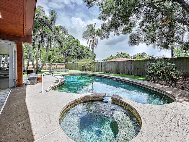 11525 Country Oaks Dr, Tampa, FL 33618 - view of swimming pool featuring a fenced backyard, a pool with connected hot tub, and a patio area